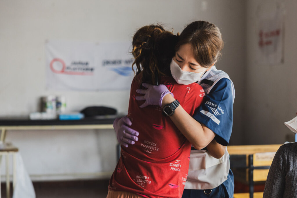 Dr. Morita with a patient at Peace Winds clinic