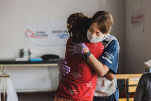 Dr. Morita with a patient at Peace Winds clinic