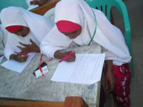 Young women strengthening literacy, numeracy, and