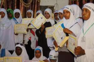 Graduates proudly celebrating successful completio