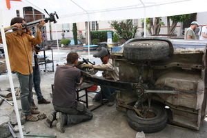 Martin and students dismantling the car