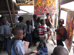 Volunteer working with students