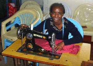 One of 8 Tailoring Trainees