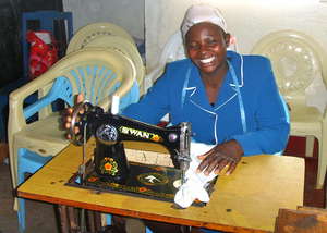 One of 8 Tailoring Trainees