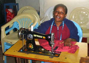 One of 8 Tailoring Trainees