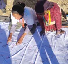ANM working in social mapping for anc check up.