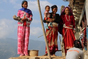 A PHASE midwife interacting with local women