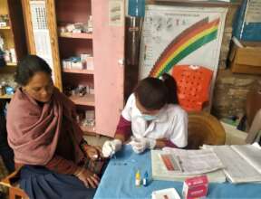 Conducting anemia test on pregnant woman.