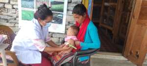 Child growth monitoring  at Mugu, Bama village.