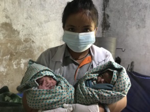 Apsara,PHASE helath supervisor with the twin baby.