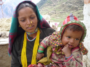 Woman with healthy baby, Maila