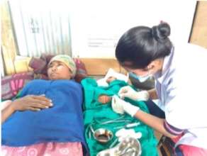 PHASE Health staff installing a contraception