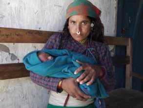 A mother after giving birth at the centre