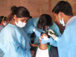 Junila attending a dental training session