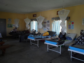 Mosquito nets at health center installed by PHP.