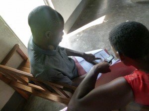 VHT members practice entering data using cell