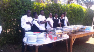 Sergoek - young caterers display goods