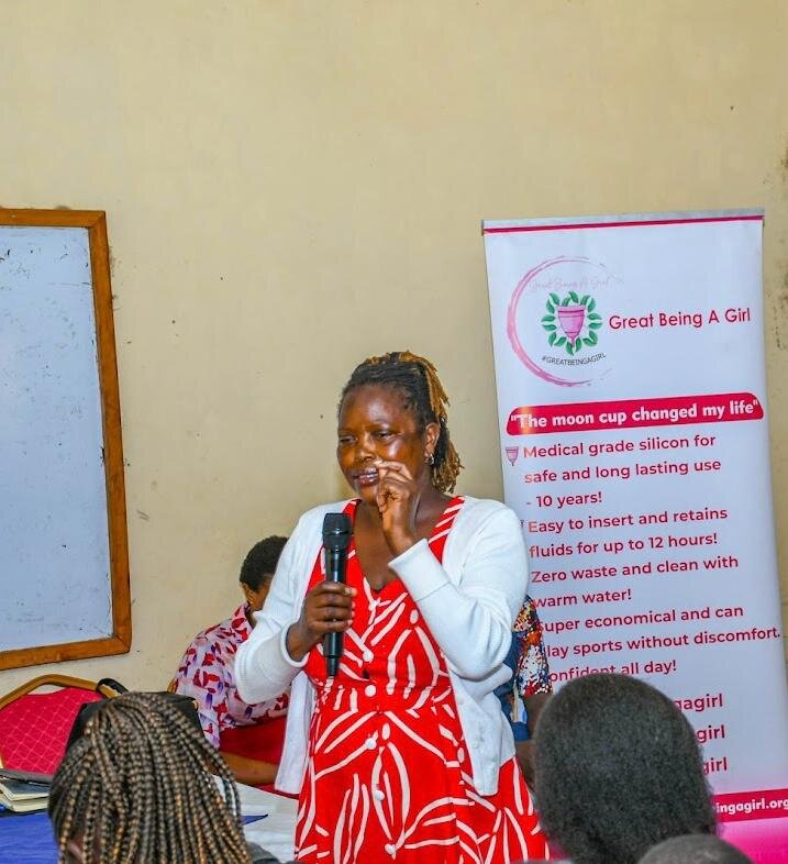 Dr. Dinah M. President RYM-K speaking to the girls