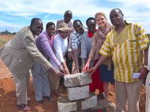 Rafiki Ya Maisha laying cornerstone