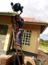 Cornelius' team installing gutters