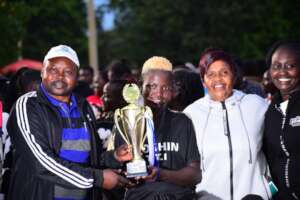 Beaming Captain with coach & Principal