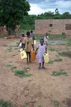 Shouldering the burden of water collection.