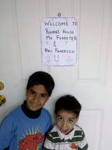 Students welcoming teachers to their home.