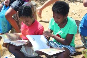Aeta children in Bataan checking out the books
