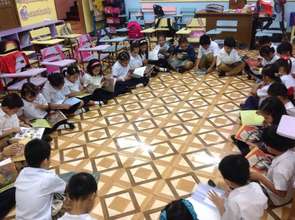 Grade 2 students in a book reading activity