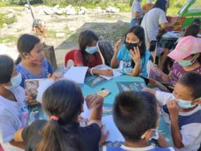 Kid's discuss the books in Victorias, Negros Occ.