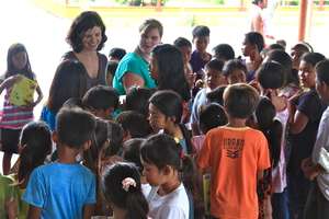 GlobalGiving's Ana and Sandra hands out our books