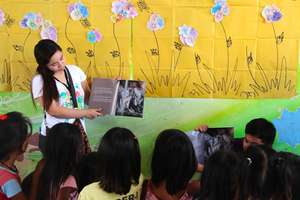 Reading aloud the story of Nadia