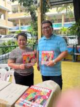 Commonwealth Elementary Principal accepts 1k books