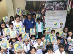 The Tiny Library Project giving away our books