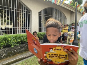 A child in Zambales starts on his new book