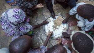 Children eat together in northern Nigeria