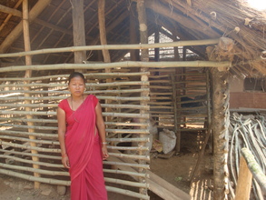 Neera in front of her New Goat Shed