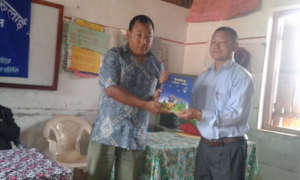 Bhawani Tawa handover the Limbu book to school