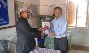 District Education officer handover the MLE manual