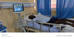 Francis lying in Hospital bed