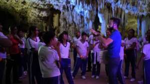 Alejandro teaching students about Maya aquifer