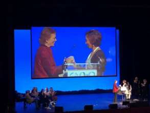 Laura receiving Mary Robinson Award