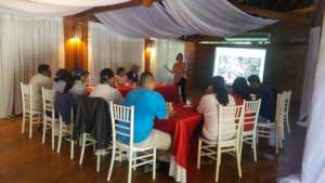 Monica delivering a workshop in Roatan