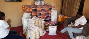 Volunteers packing items Christmas 2025