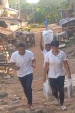 Volunteers delivering Christmas items 2025