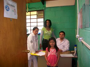 Team of dedicated staff reviewing patient's needs