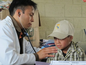 A boy is examined during a Mobile Clinic visit.