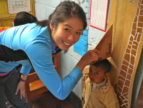 Volunteer Measuring Students for Check-ups