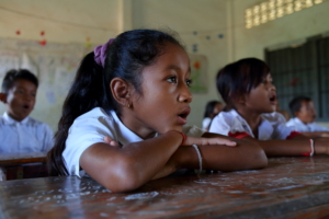 A child studies in Cambodia