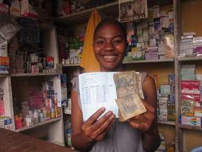 Noelle Bangu, a shop assistant and client of PMI